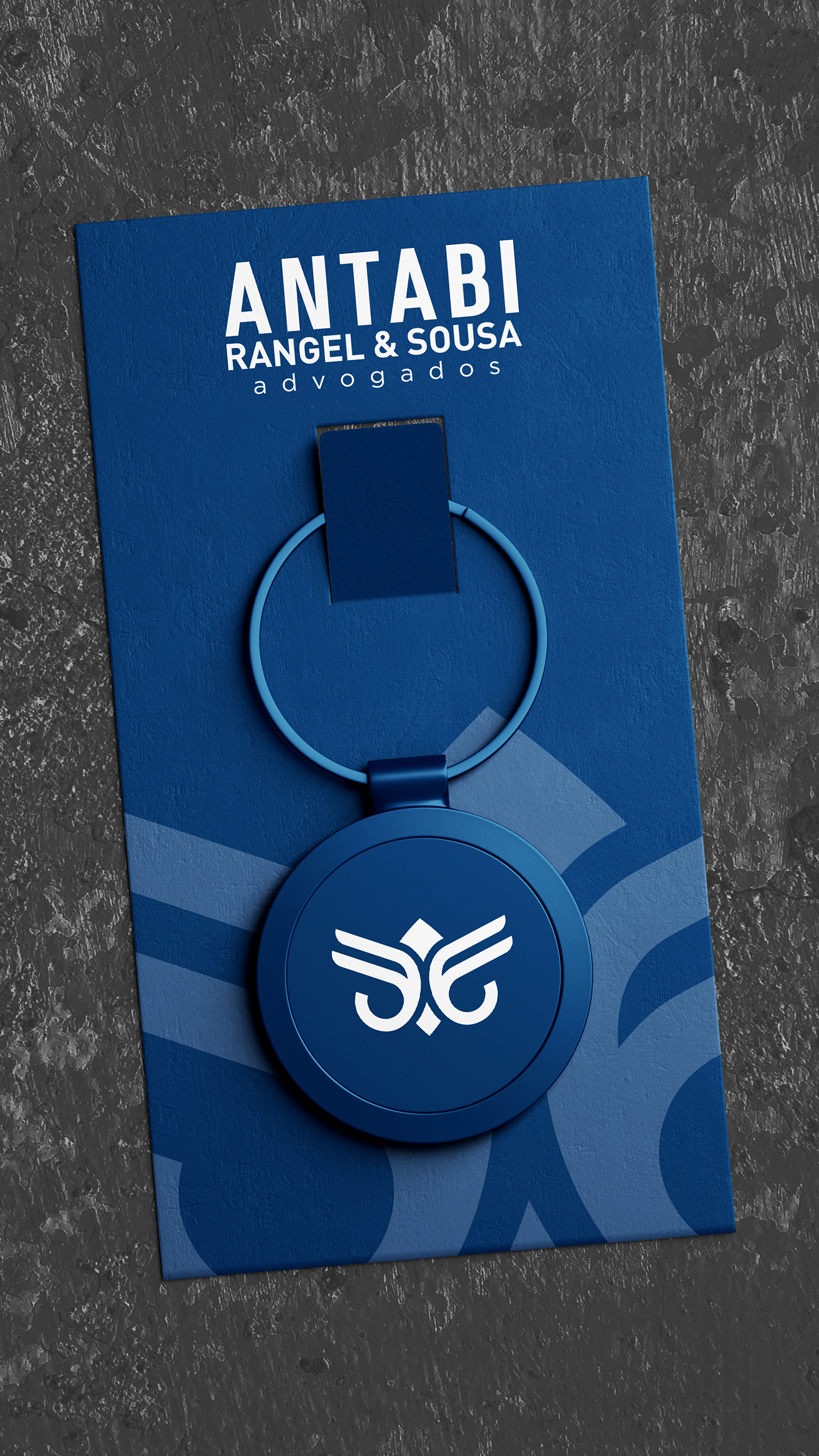 Antabi, Rangel, Sousa, & Goes A blue card with a keychain on it that says ' antabi ' on it