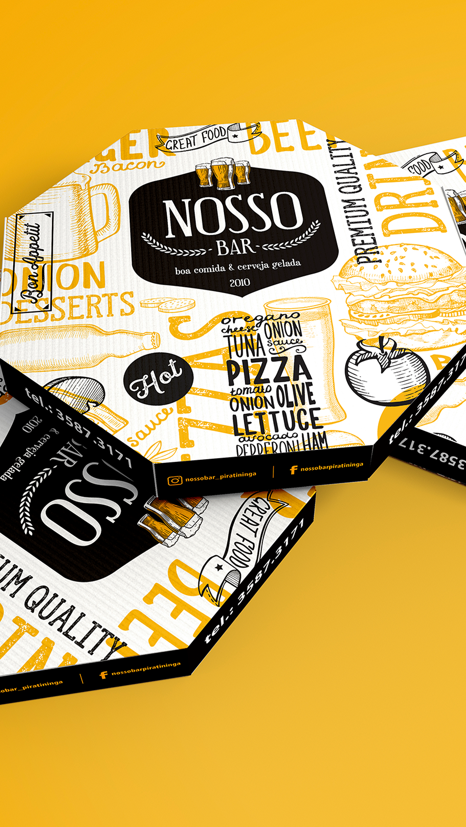 Three pizza boxes are stacked on top of each other on a yellow background.