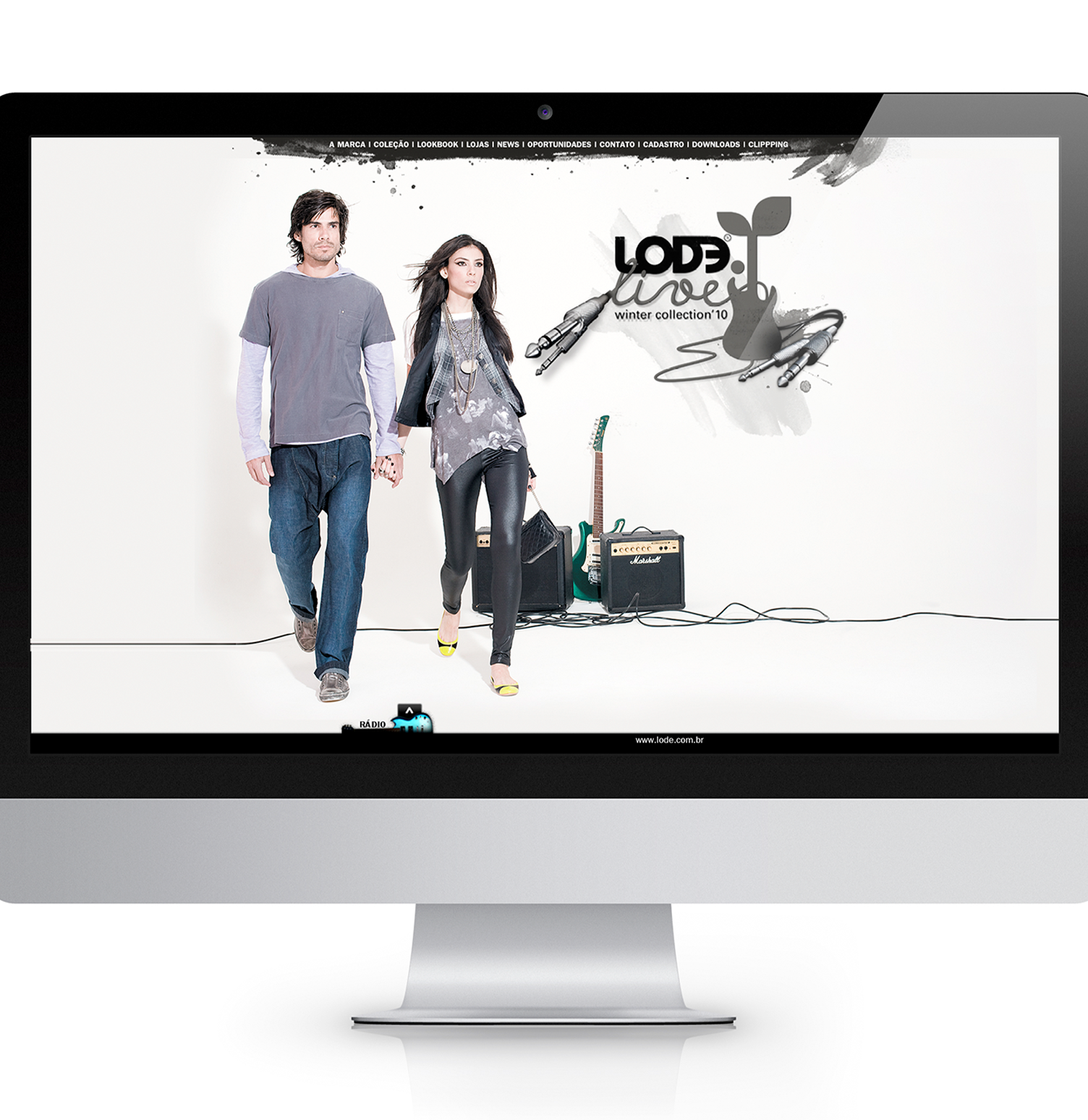 A computer screen shows a man and a woman holding hands