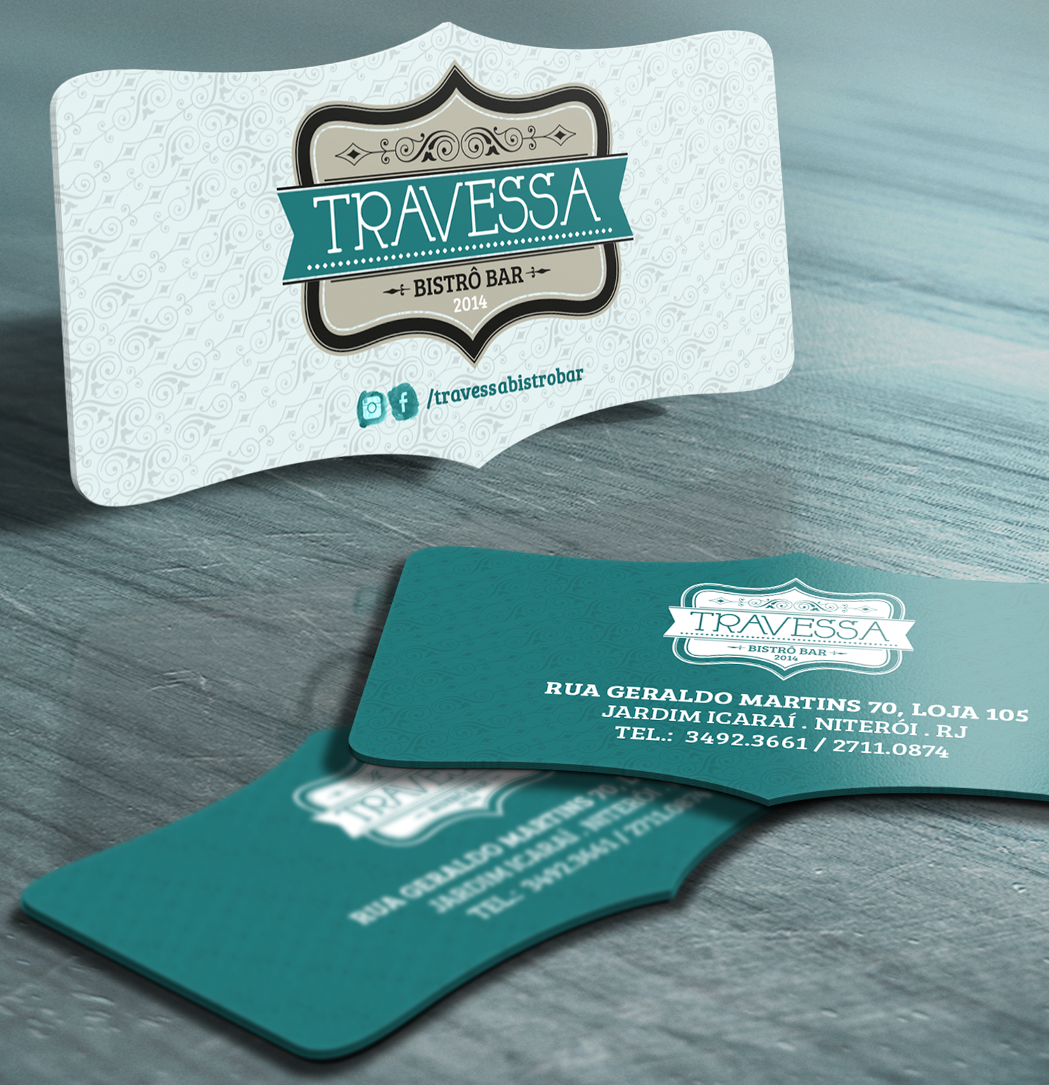 Travessa A business card for travessa is sitting on a wooden table