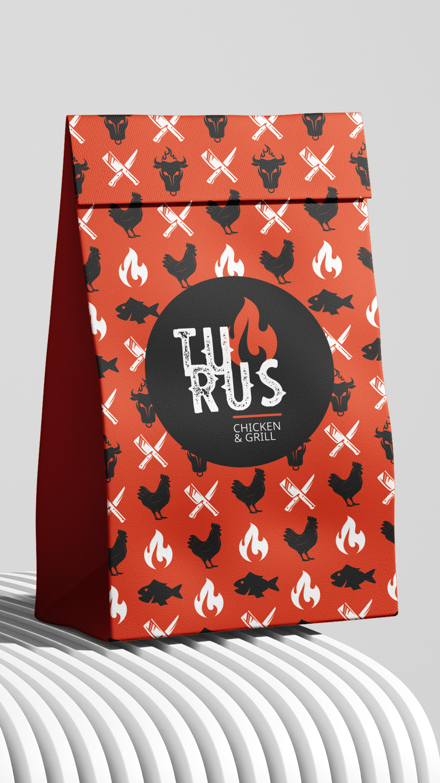Turus Uma bolsa vermelha com um padrão de galinhas e animais