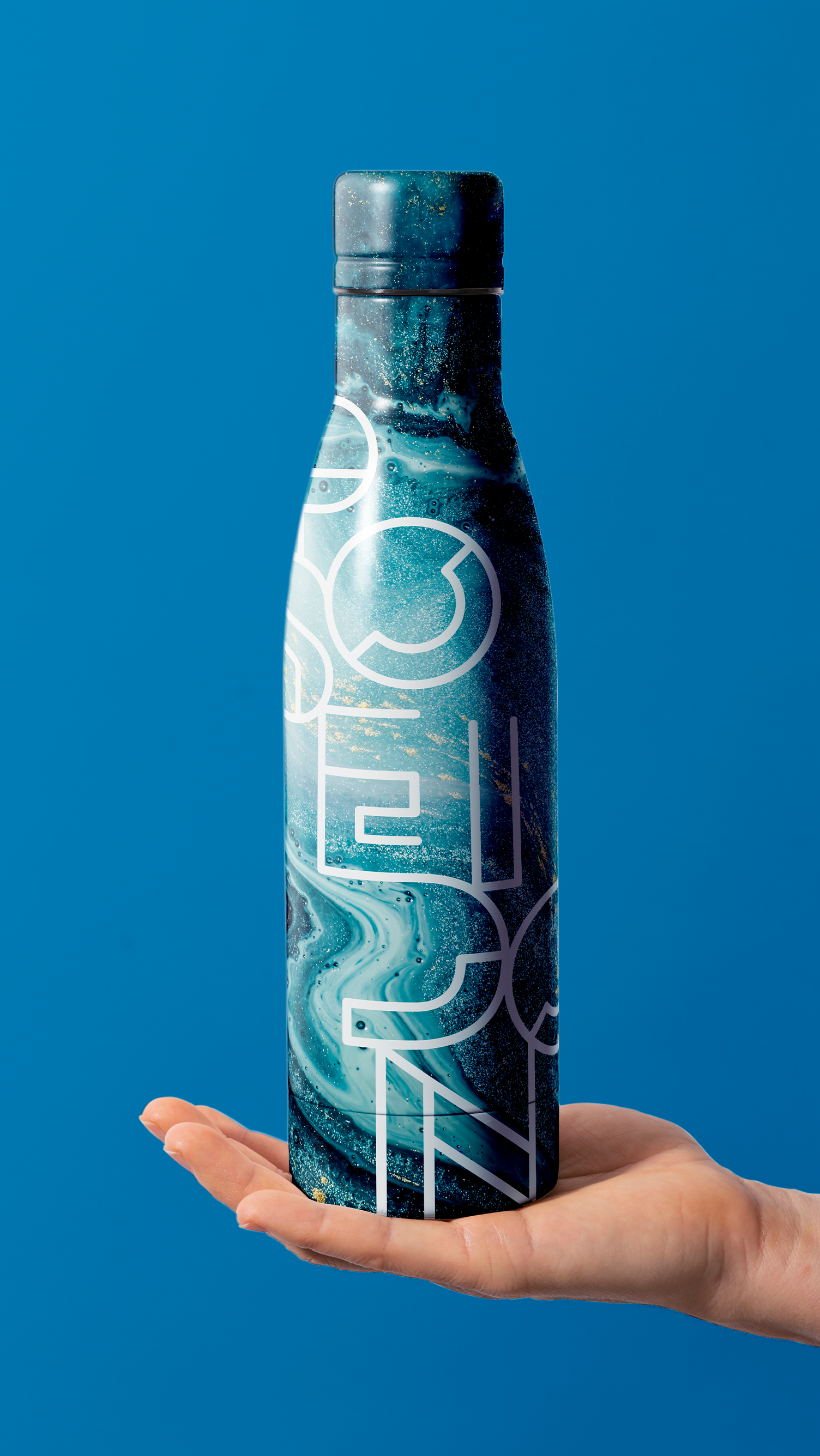 Poseidon Energy Drink A person is holding a blue water bottle in their hand.