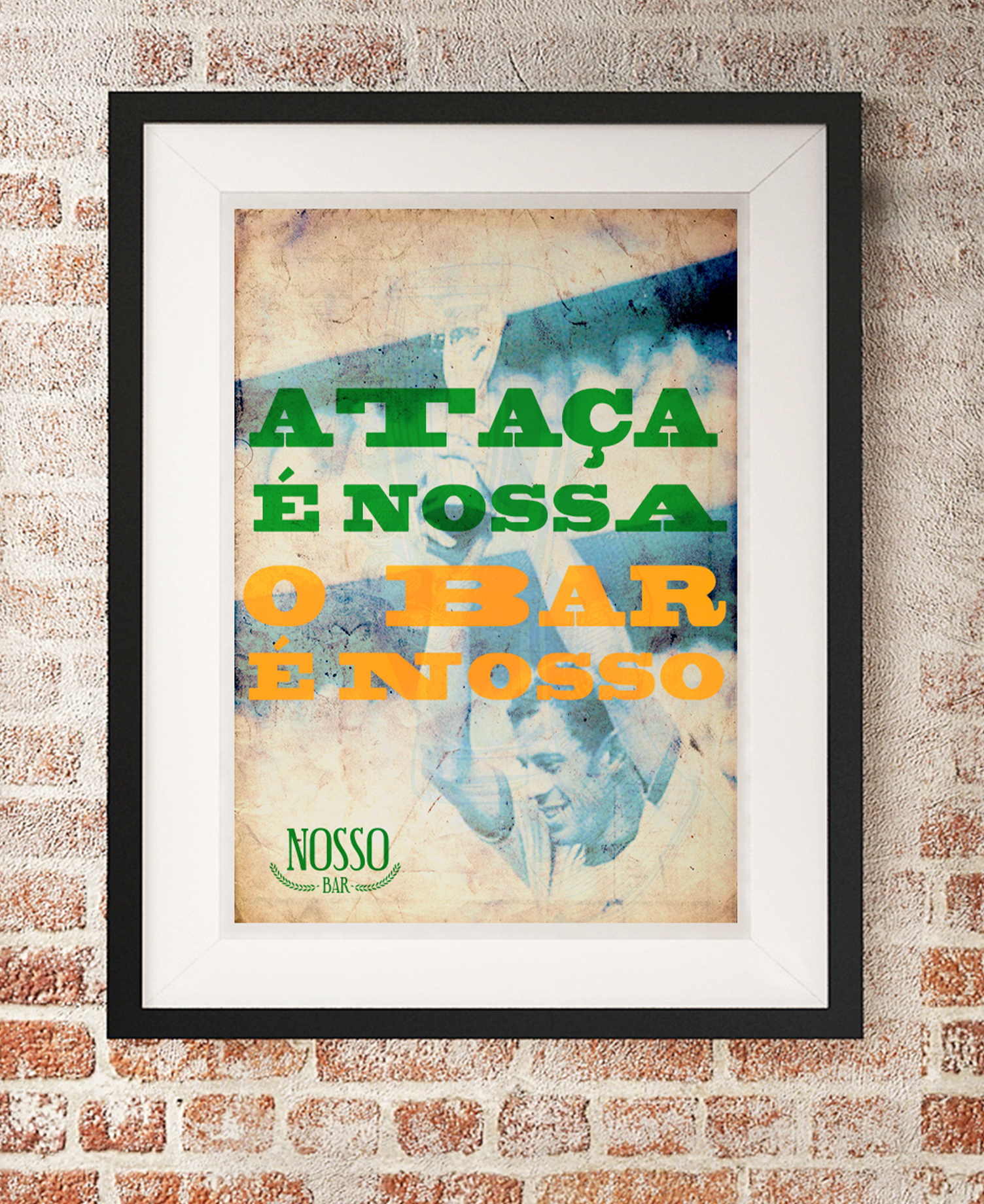 A framed poster on a brick wall that says ataca e nossa