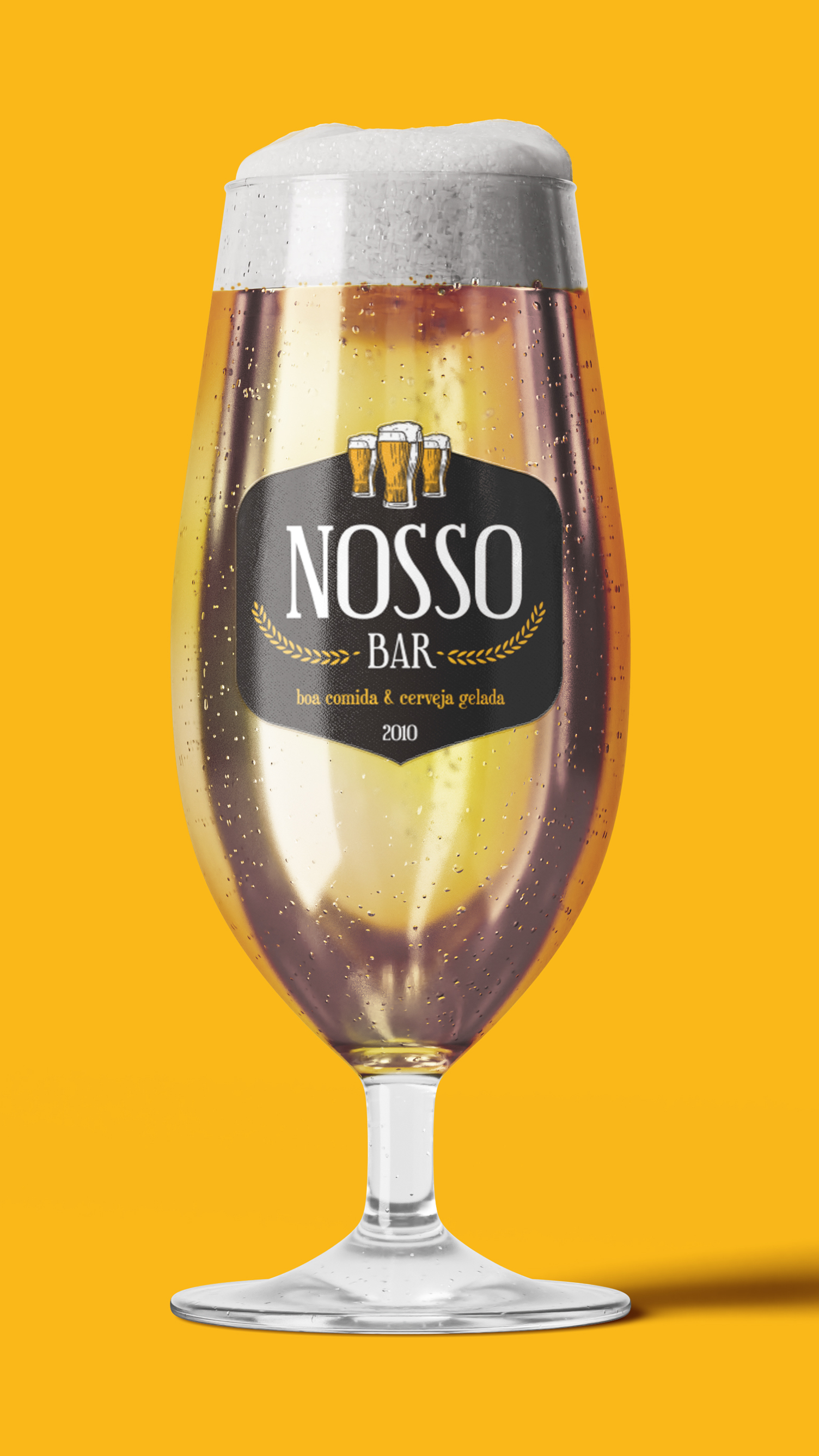 A glass of beer with foam on top of it on a yellow background.
