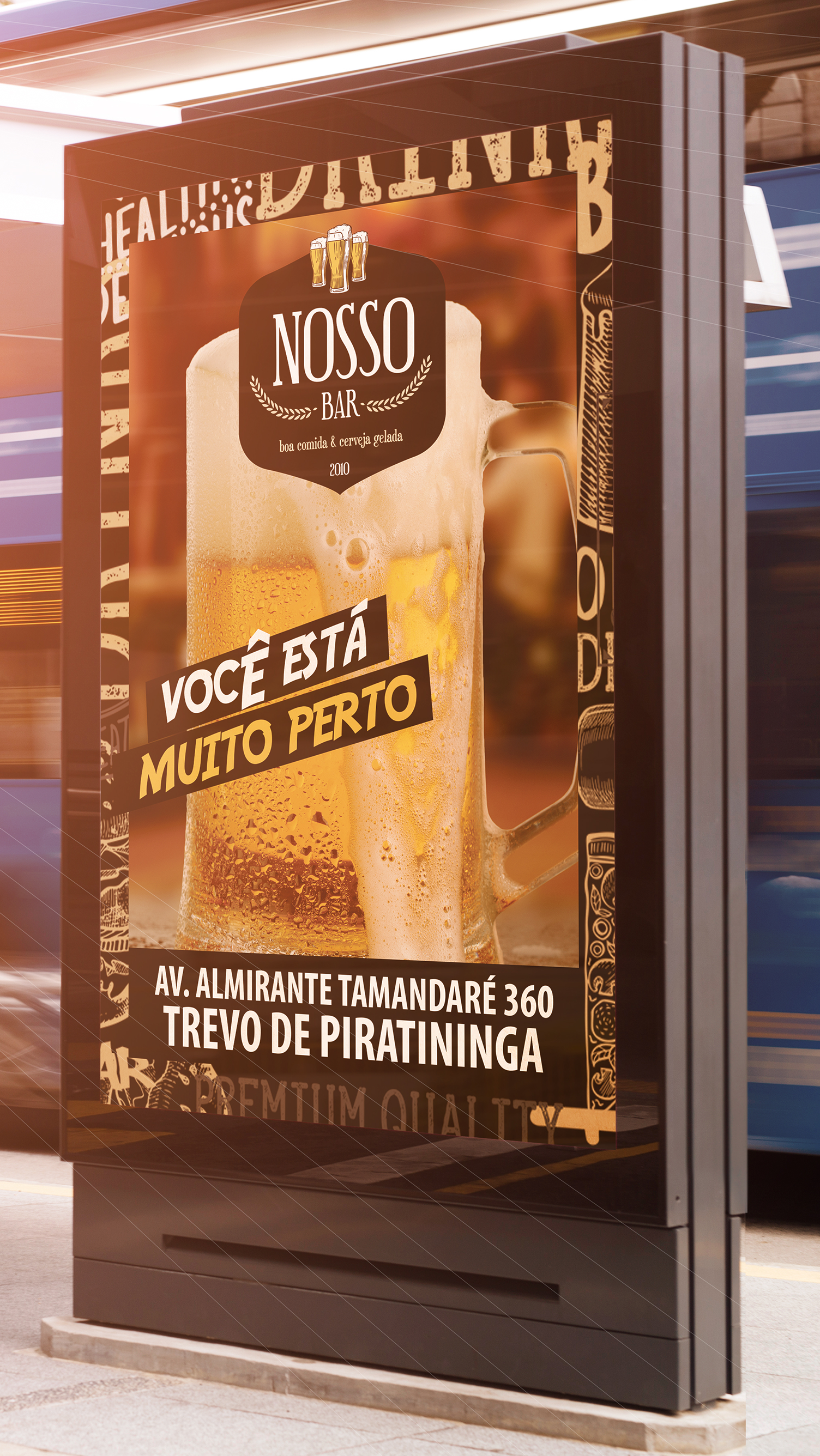 A large billboard with a glass of beer on it.