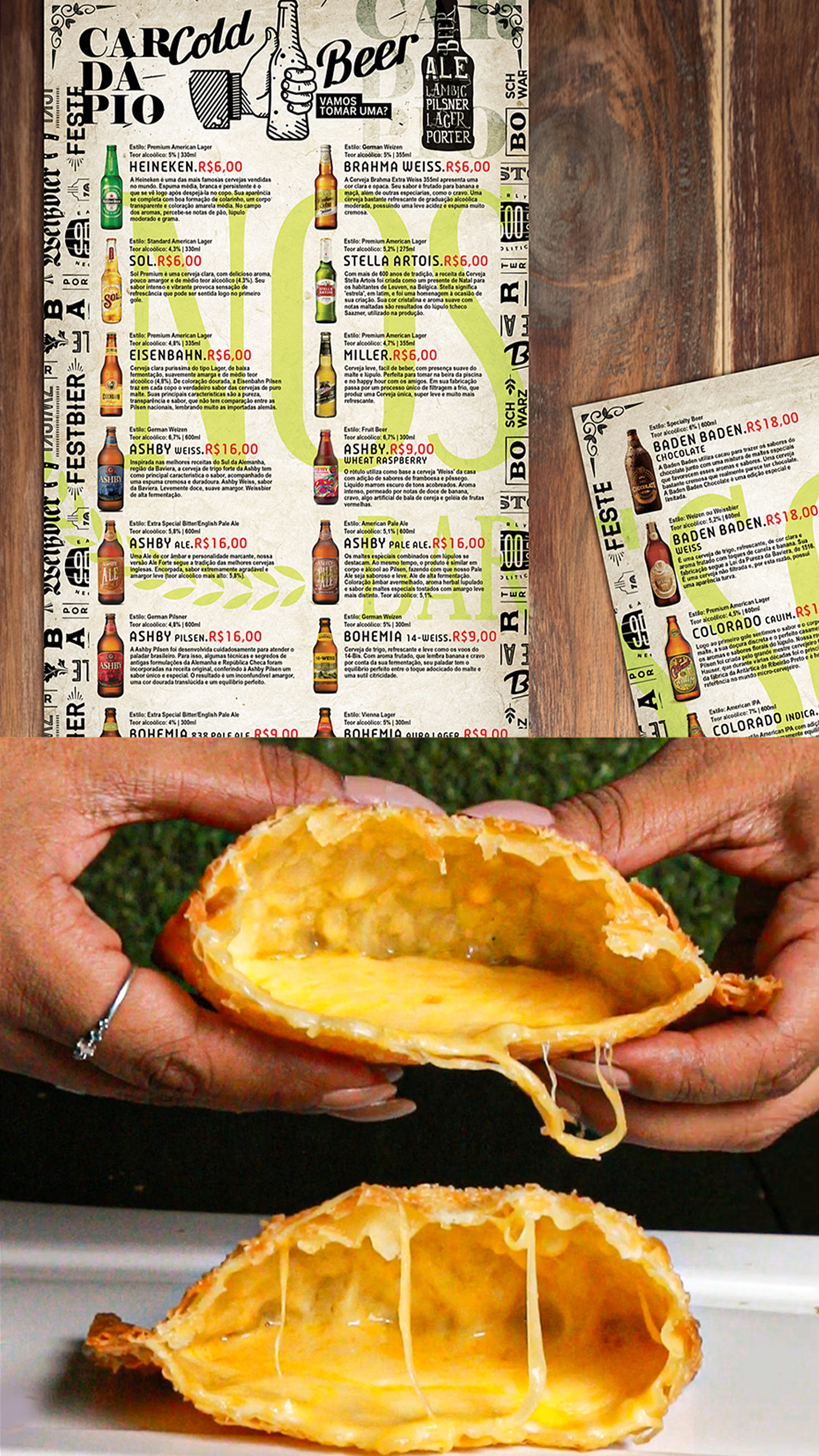A person is holding a taco with cheese on it in front of a menu.