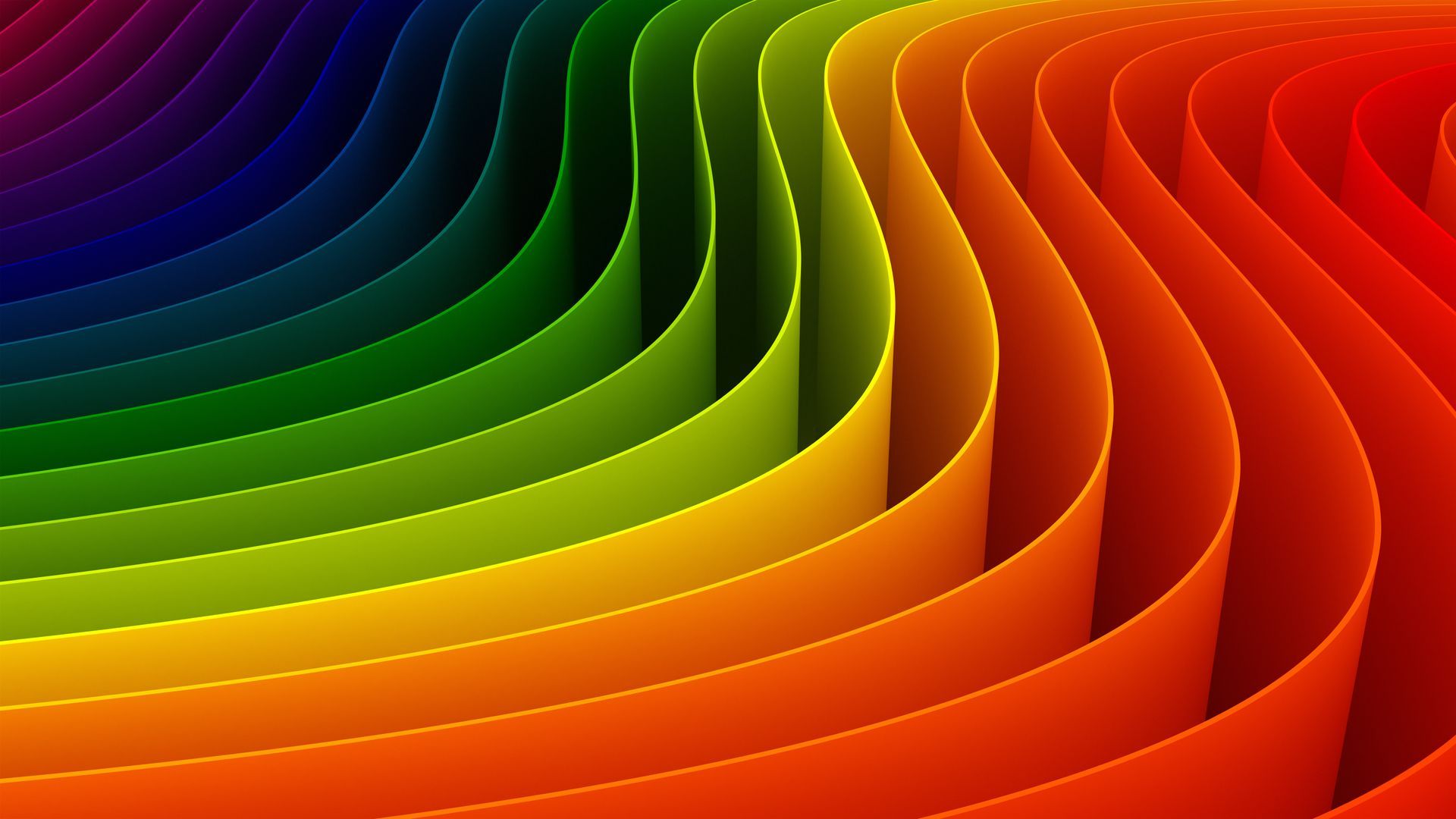 Um close de um arco-íris de fitas coloridas