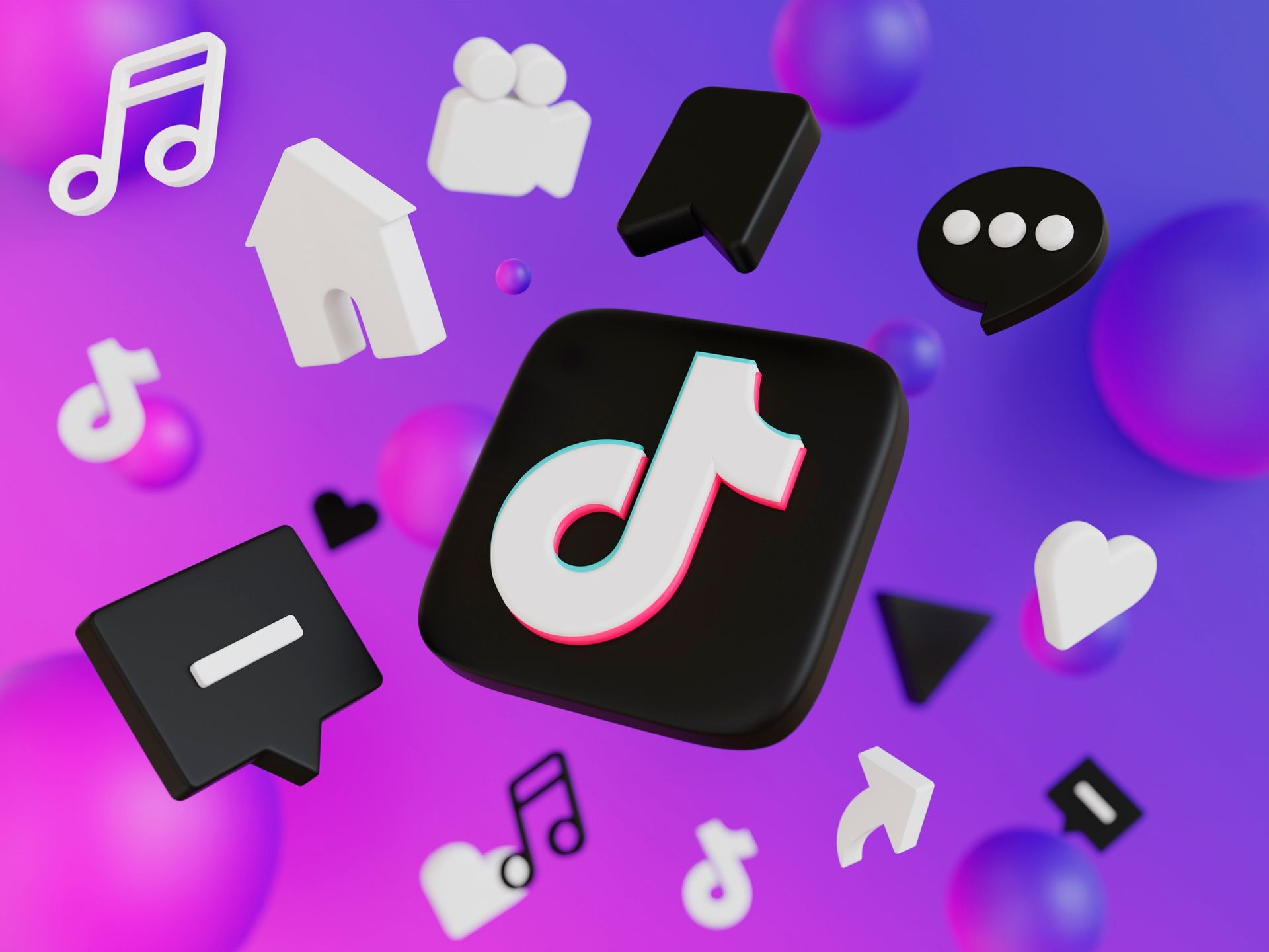 Um ícone do TikTok cercado por outros ícones em um fundo roxo.
