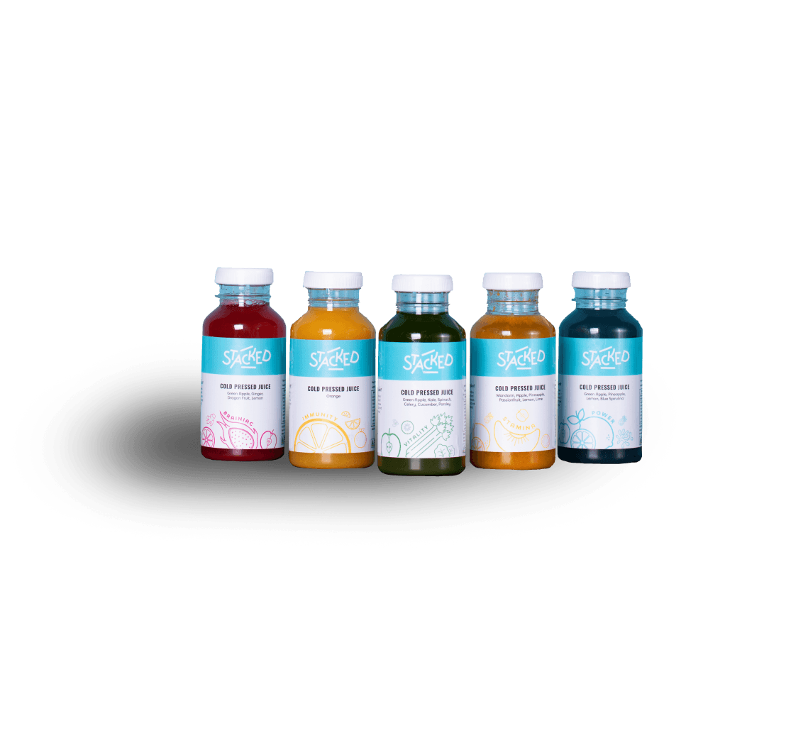 Five bottles of colorful juices lined up against a white background, each with a blue label and white cap.