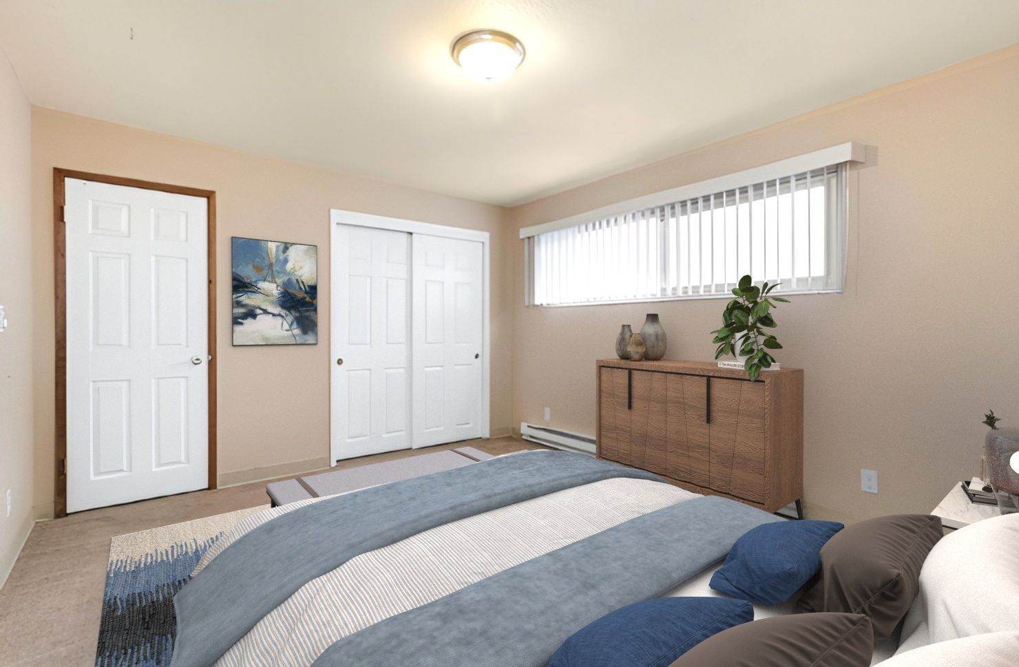 A bedroom with a bed , dresser , and window.