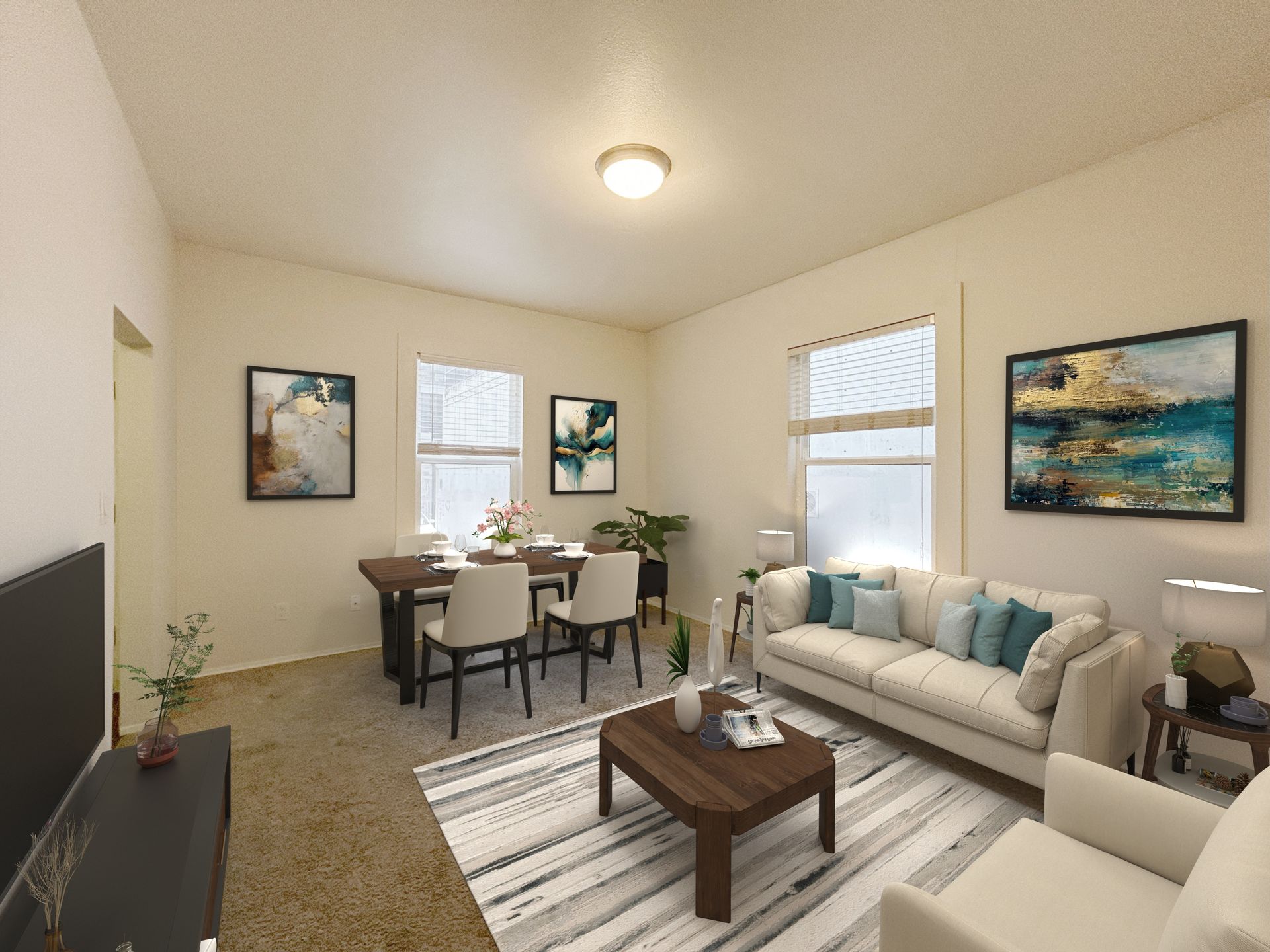 A living room with a couch , chairs , table and television.