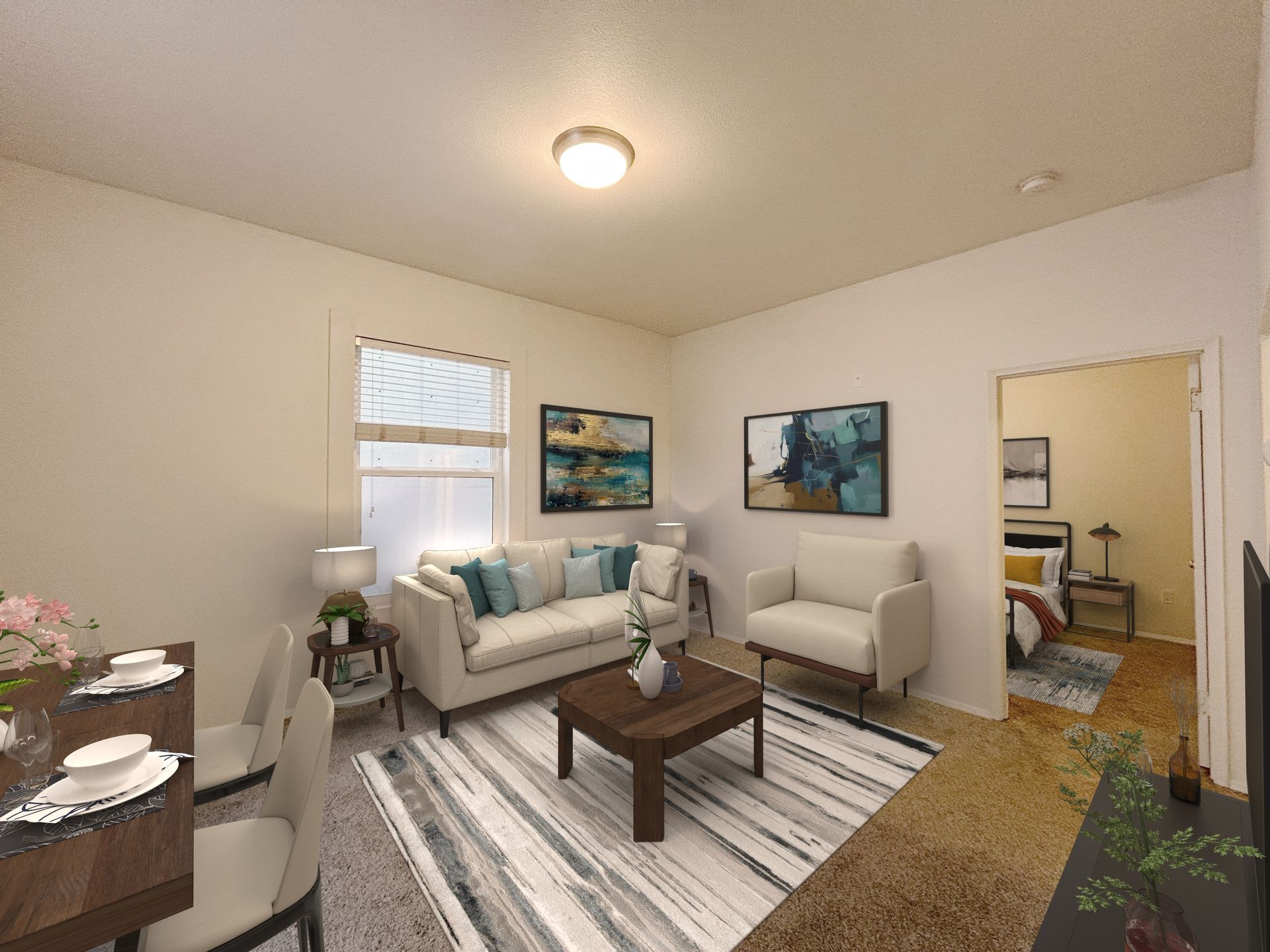 A living room with a couch , chair , table and rug.