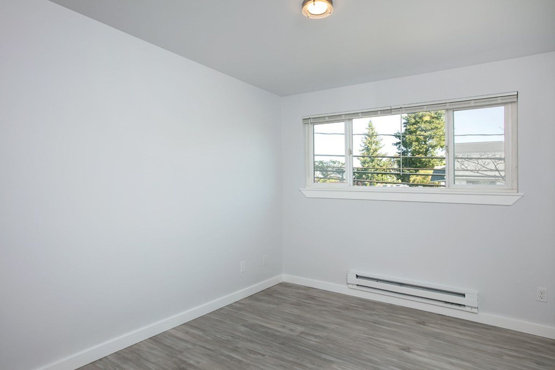 There is a large window in the middle of the room.