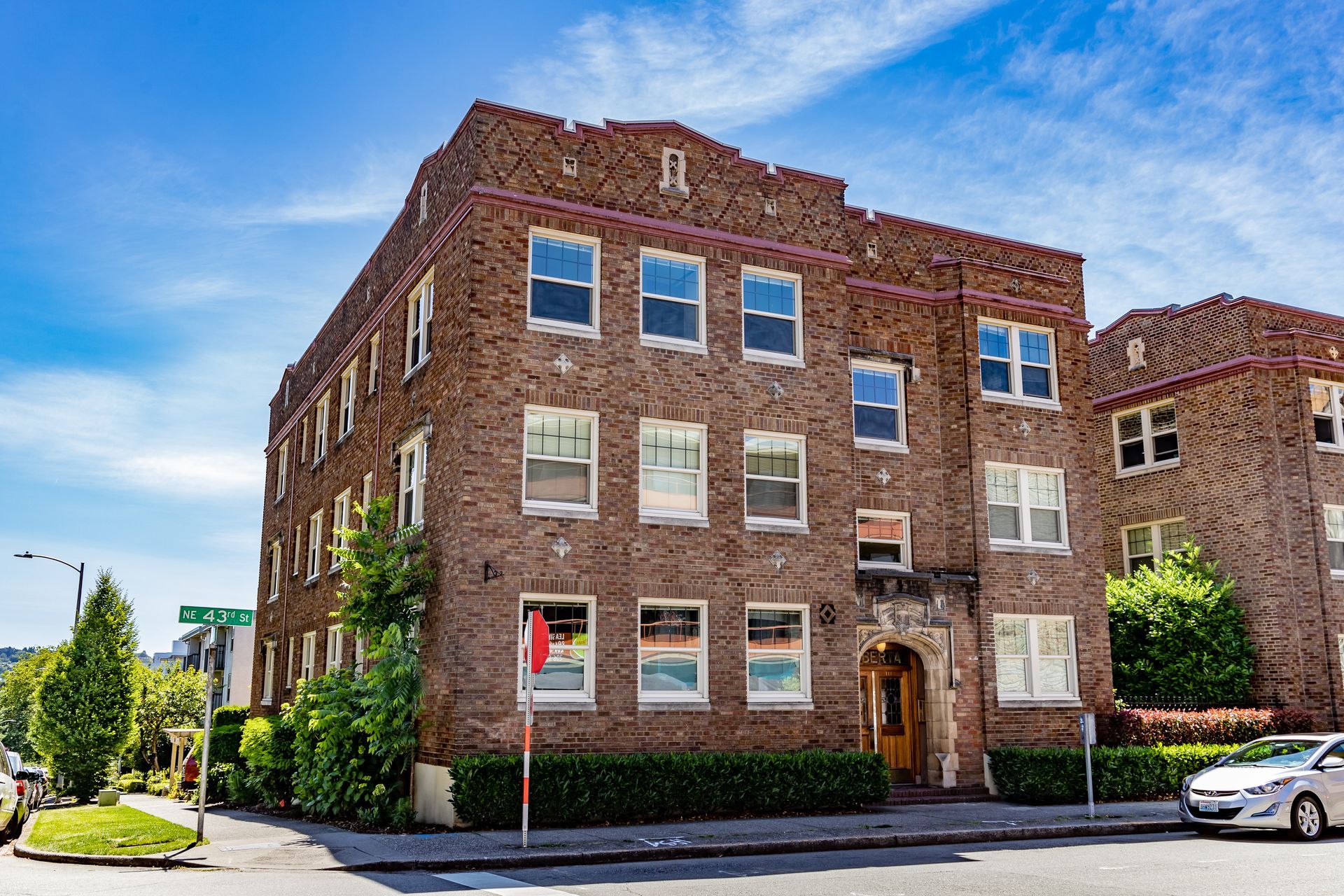 A large red building with a staircase leading up to it