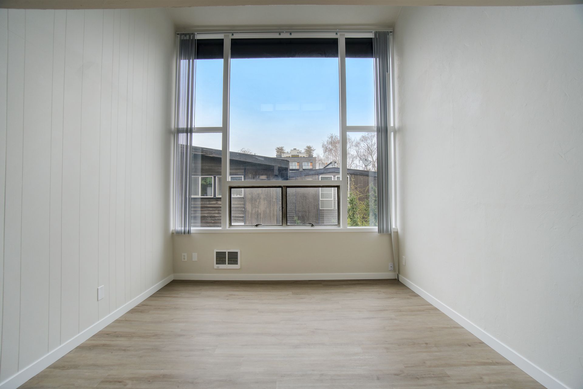 There is a large window in the middle of the room.