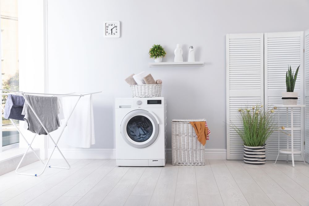 Laundry Room Interior With Washing Machine Near Wall — Bananacoast Waterproofing in Grafton, NSW