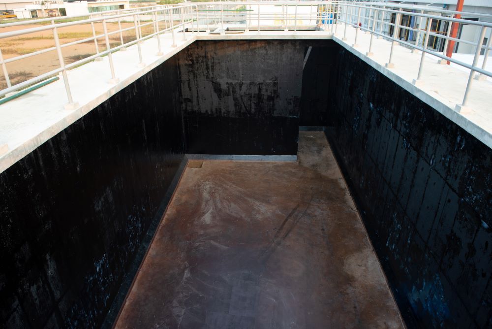 Waterproofing Coating Paint In Wastewater Tank Building — Bananacoast Waterproofing in Nambucca Heads, NSW