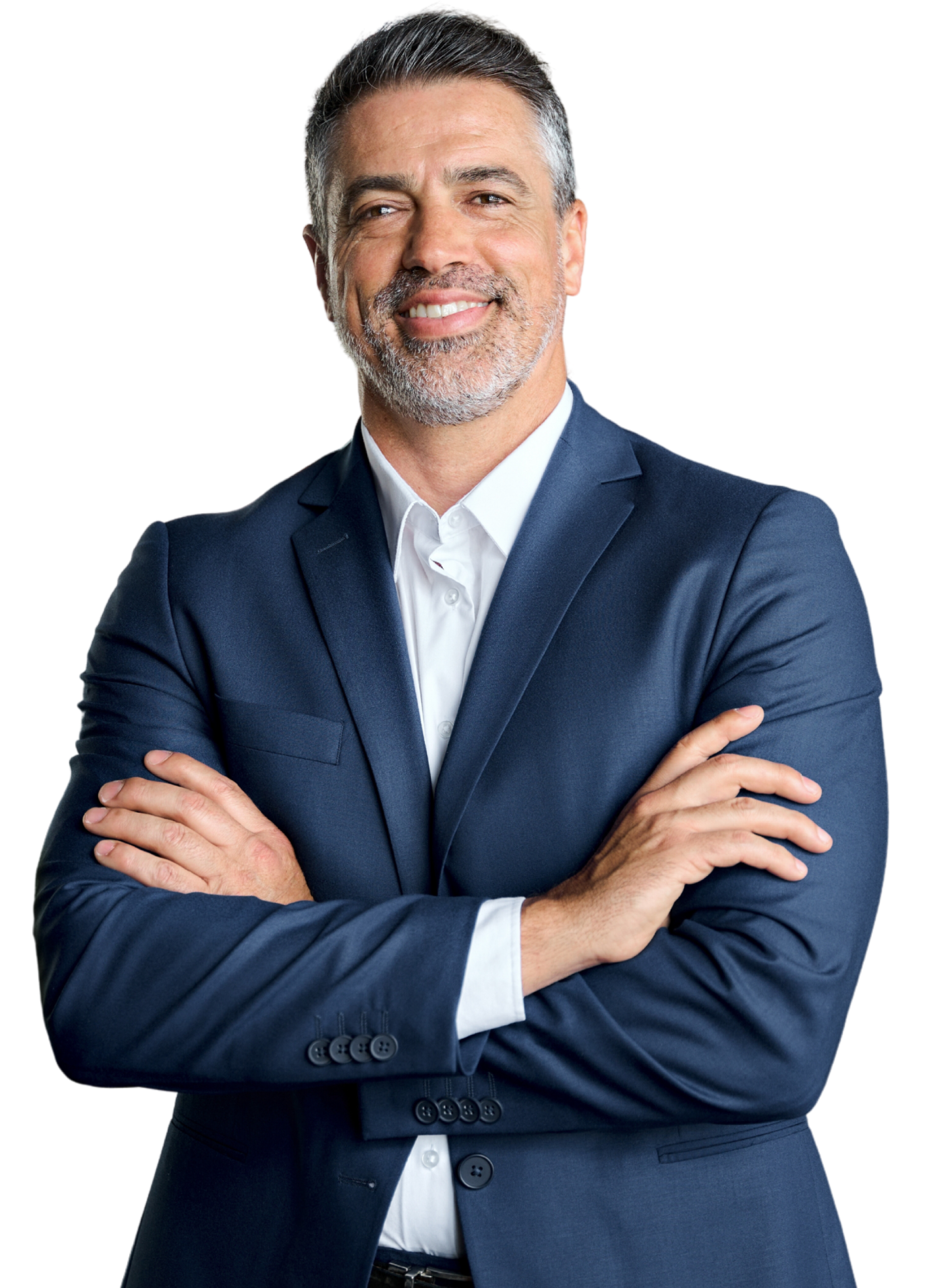 Man with crossed arms, smiling, wearing a navy blazer and white shirt.