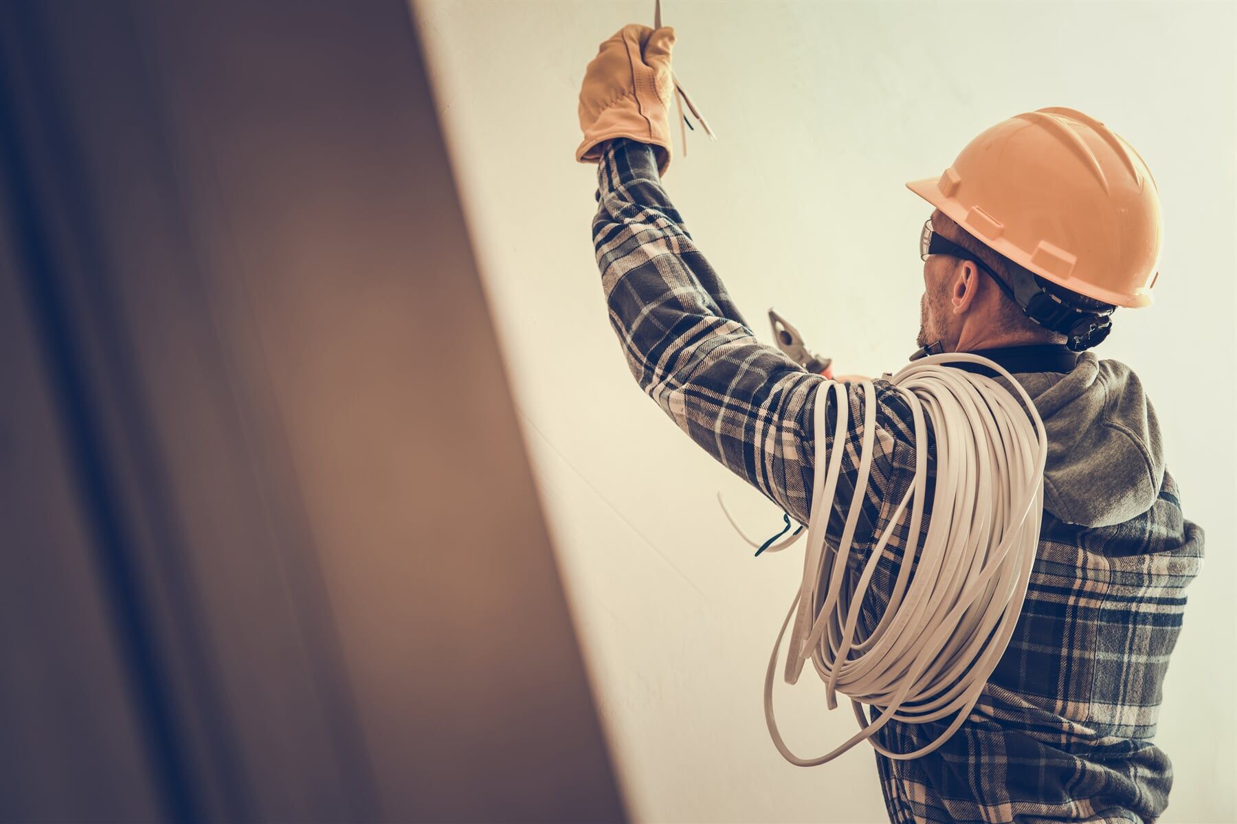 Electrician Fixing The Wires — Trusted Electricians in Nowra, NSW