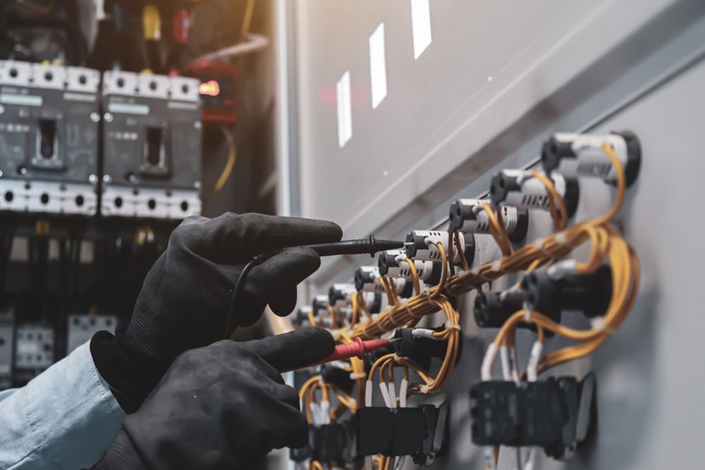 Electrician Setting Up The Wires — Trusted Electricians in Nowra, NSW