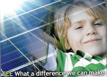 Child Smiling With Solar Panel On Its Back — Solar Panel Installations in Nowra, NSW