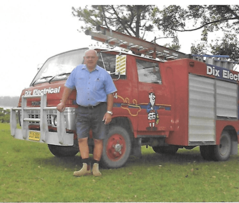 Man Picture With Truck on His Back — Trusted Electricians in Nowra, NSW