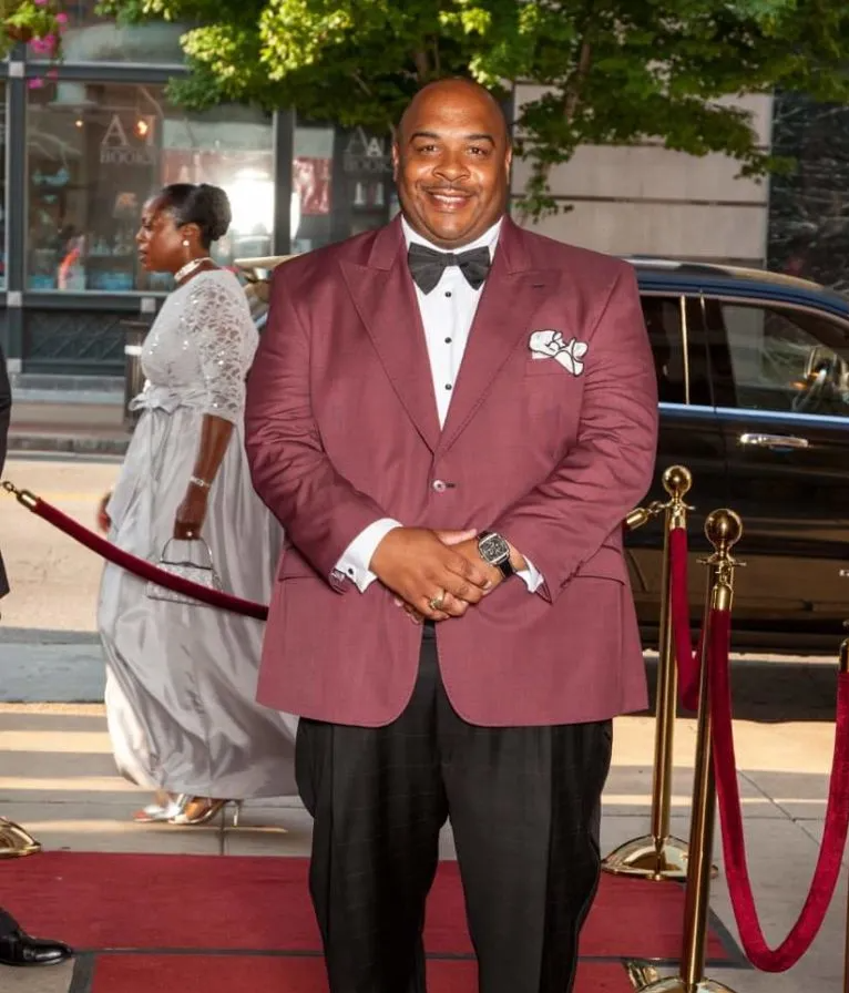 Rickey Wearing a Burgundy Suit