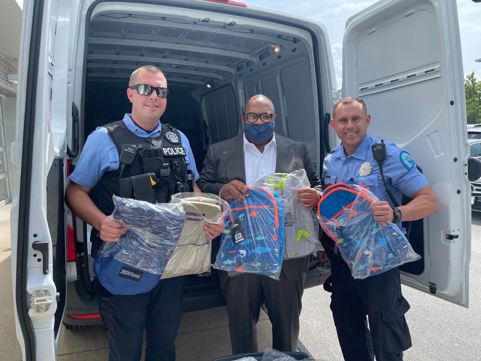 Rickey Whittington and Two Male Police Officers