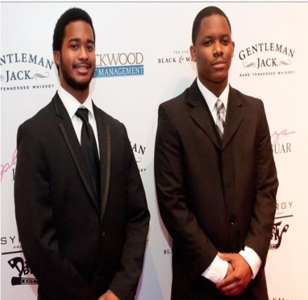 Two Teenage Boys Wearing Black Suit in Black and White Ball