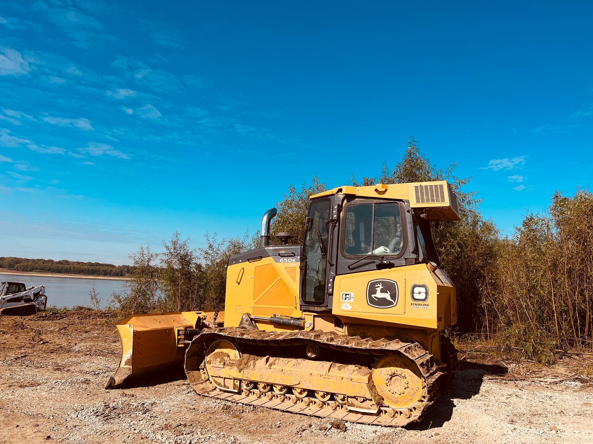 earth mover picking up dirt