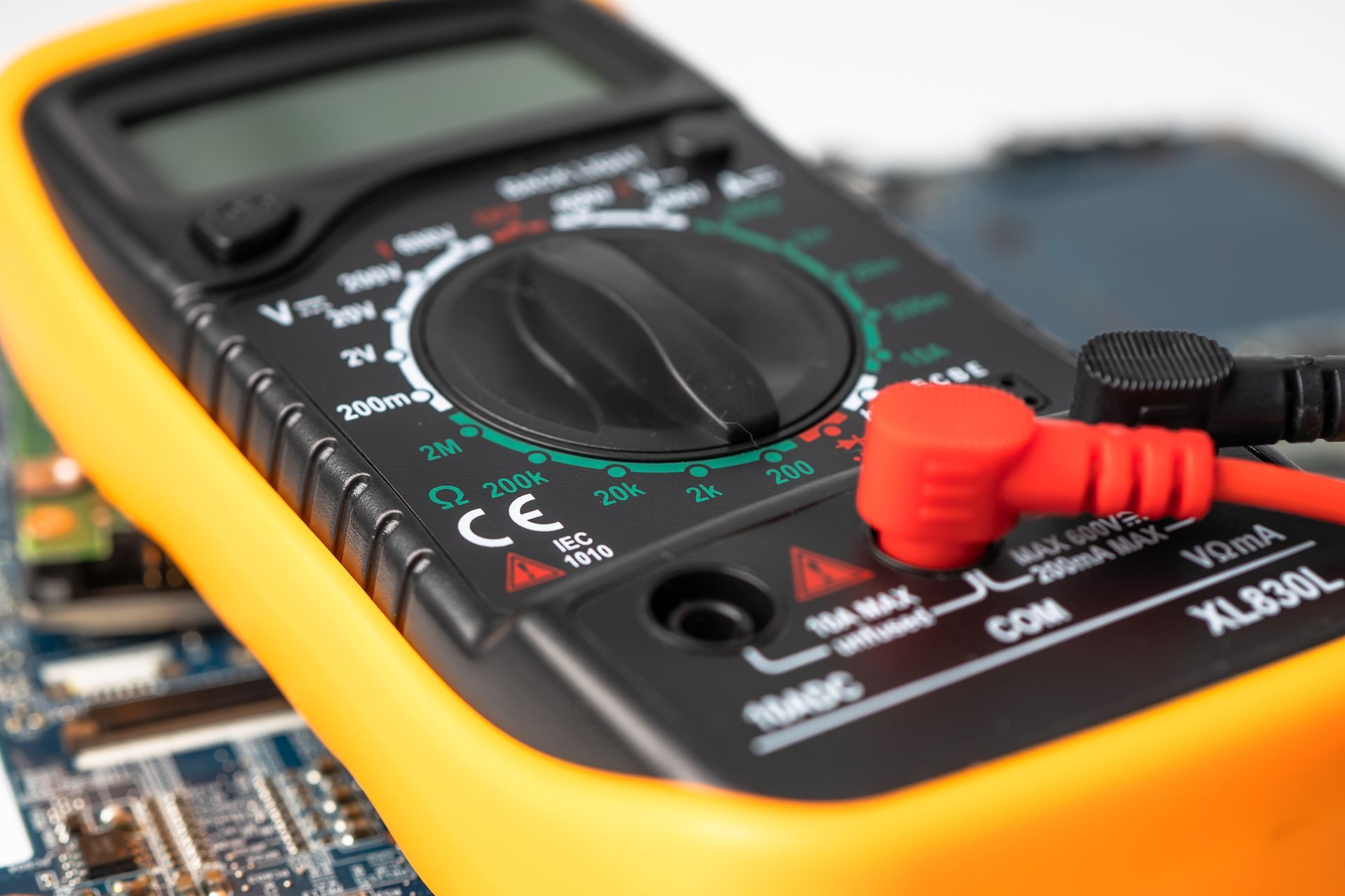 Digital electronic multimeter measuring electrical voltage. Digital electronic multimeter measuring electrical voltage.