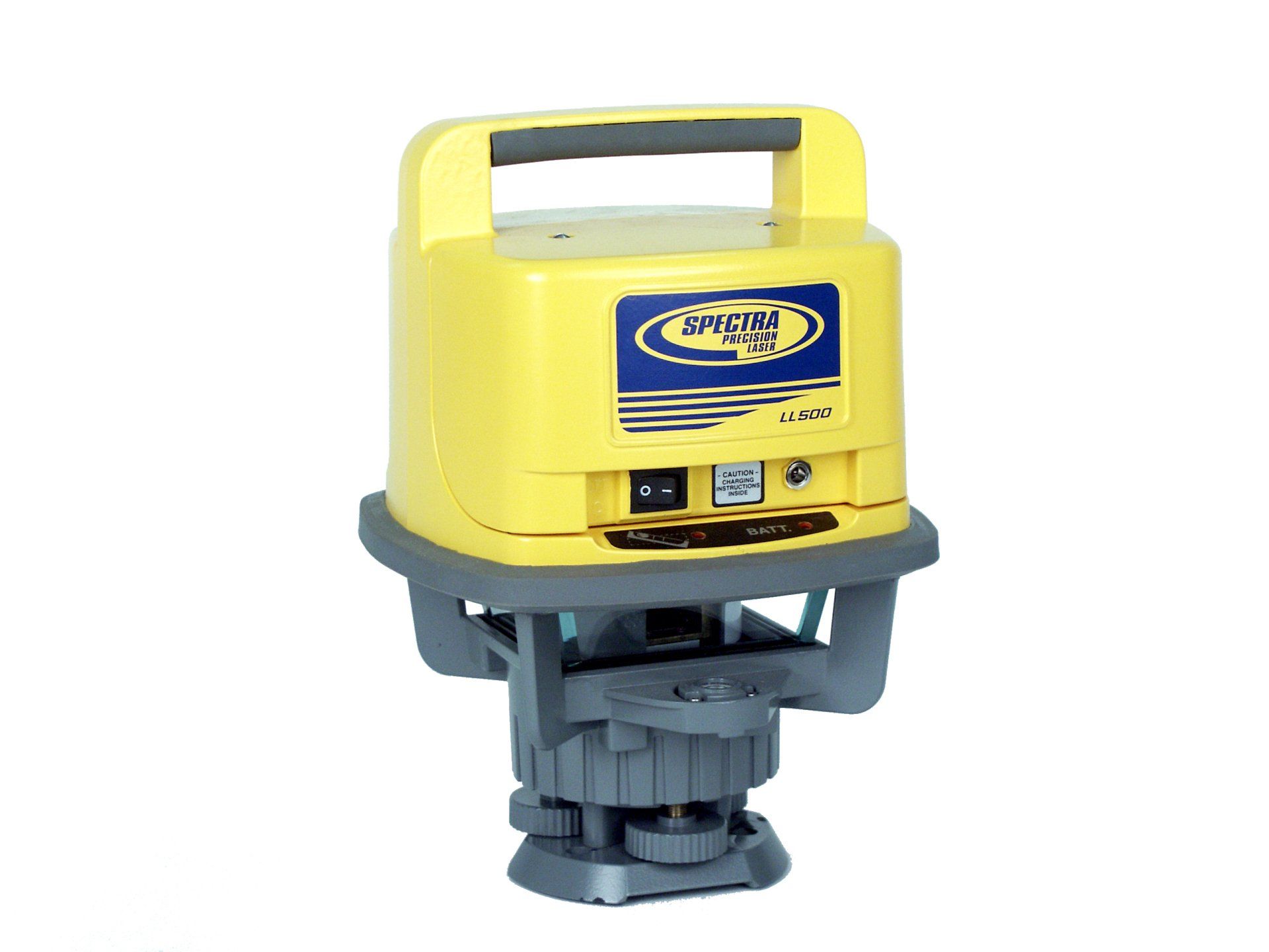 Yellow industrial rotary laser level on a gray base and tripod mount