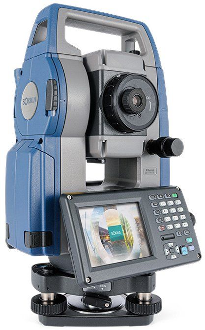Blue and gray surveying instrument with digital display and tripod mount