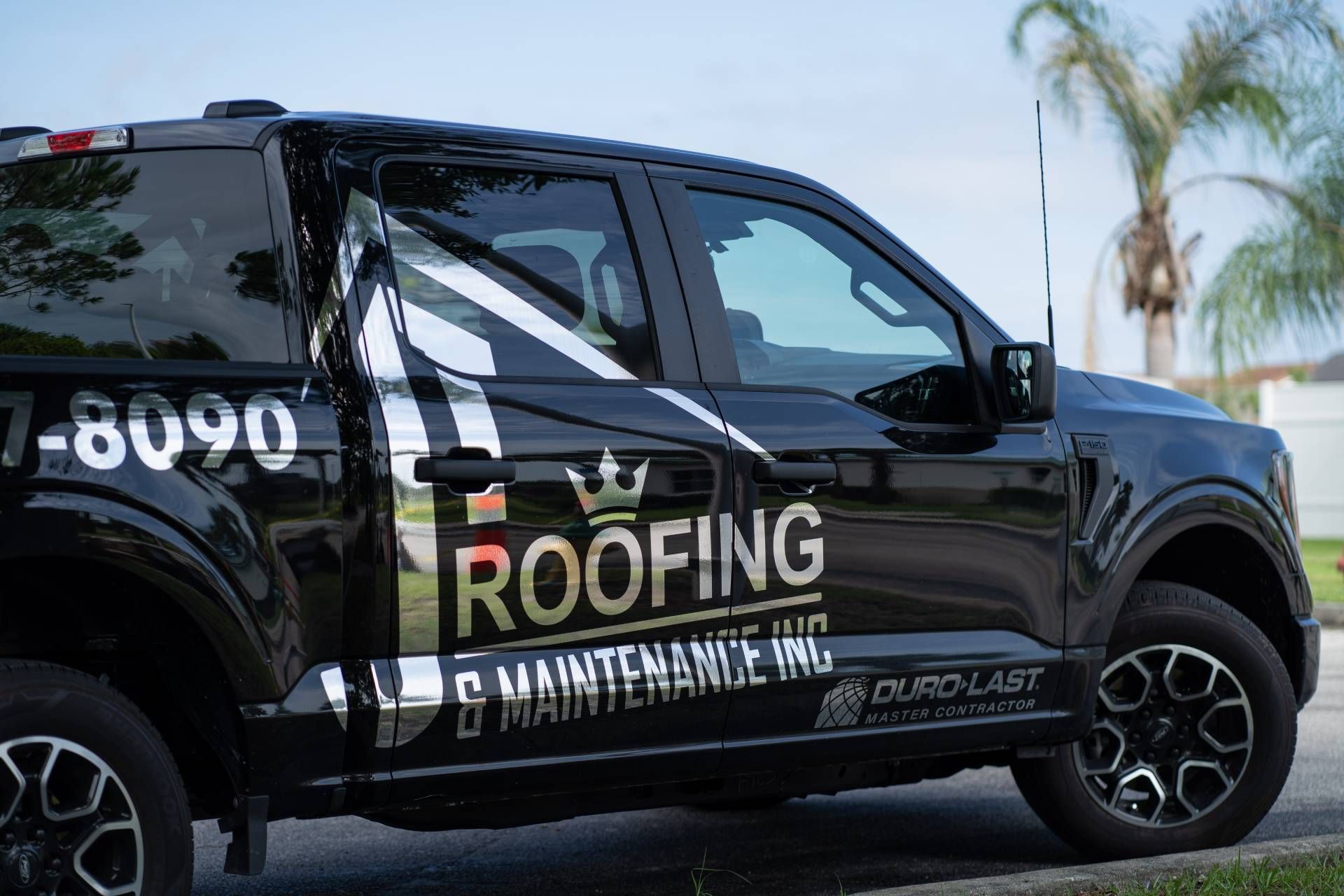 JT Roofing company vehicle in Melbourne FL