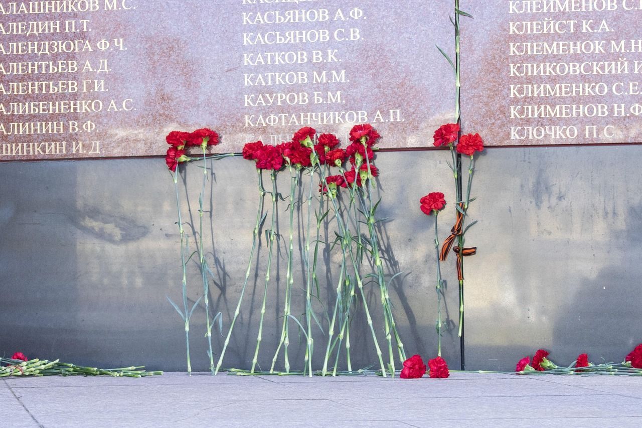 Red carnation placed in remembrance, representing love, honor, and lasting tribute through cremation services in Edinburg, TX.