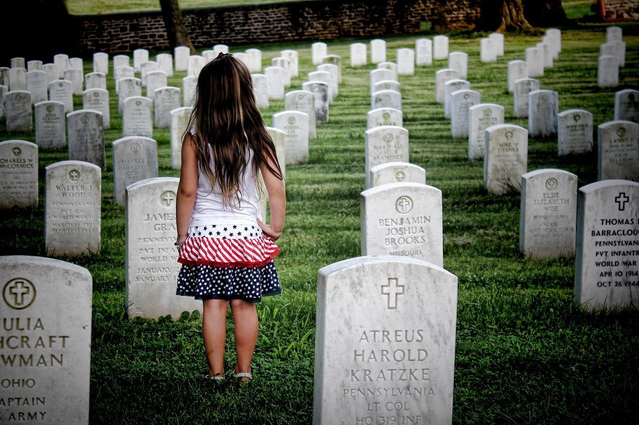 Rows of headstones at a peaceful national cemetery, honoring loved ones with dignity through cremation services in Pharr, TX.
