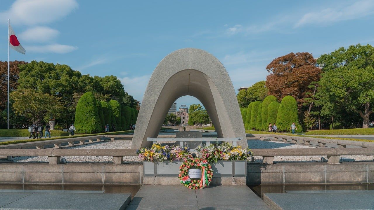 Peace memorial monument surrounded by greenery, symbolizing reflection, remembrance, and hope through cremation services in San Juan, TX.