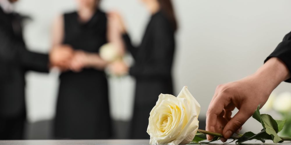 White rose placed during a funeral arrangement meeting in Pharr, TX.