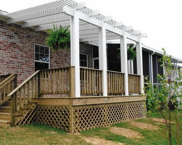 A house with a porch and a screened in porch