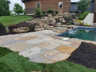 in ground pool installed by Hays Rock Works