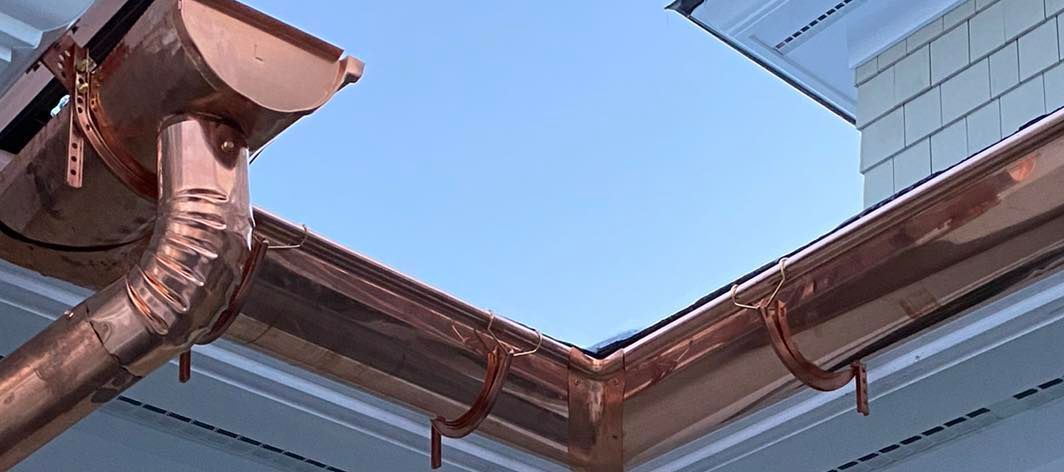 New Hampshire copper seamless rain gutters newly installed by SNJ Seamless Rain Gutters