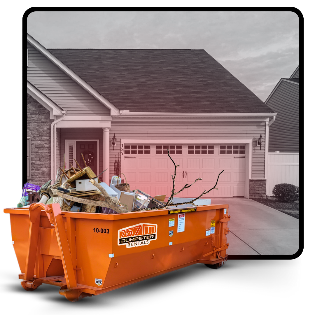 A dumpster loaded with trash in front of a house