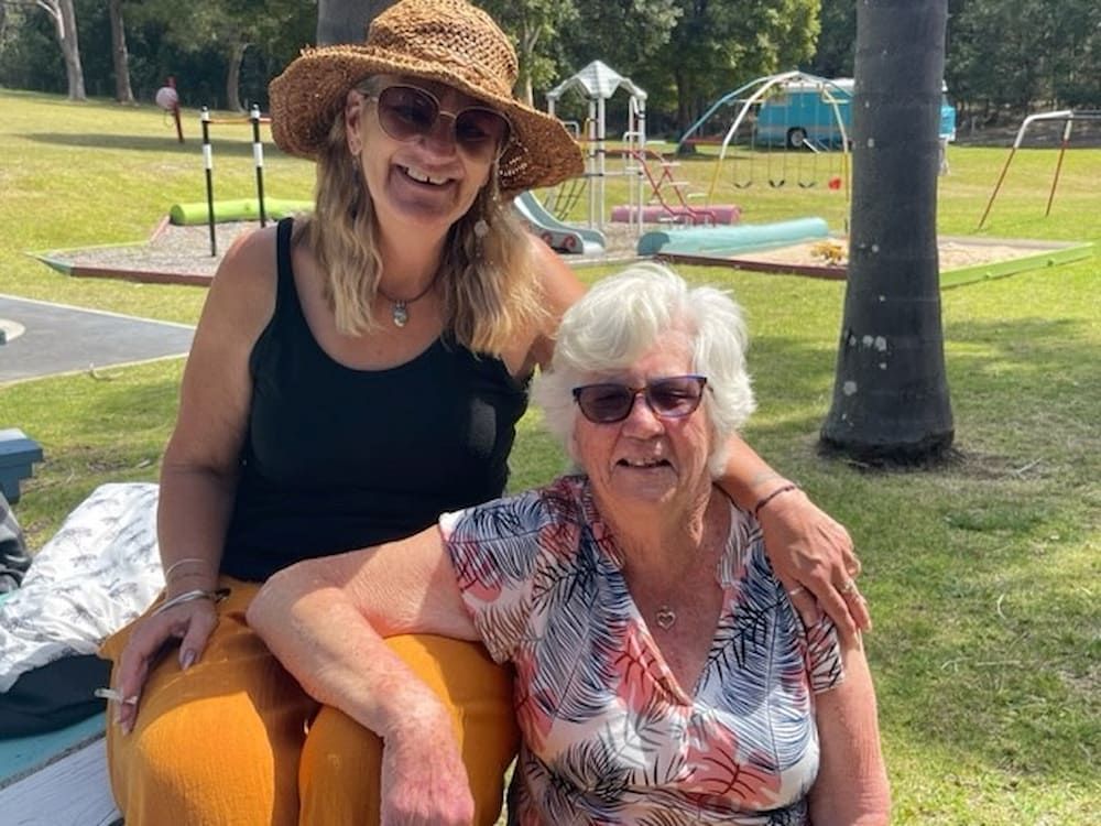 Two Women Smiling Outdoors — SeaChange Parks Milton in Milton, NSW