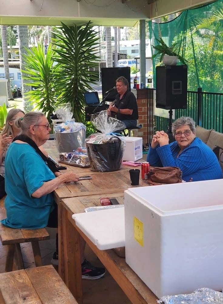 People at an Outdoor Event With Prizes, a Dj, and a Table — SeaChange Parks Milton in Milton, NSW