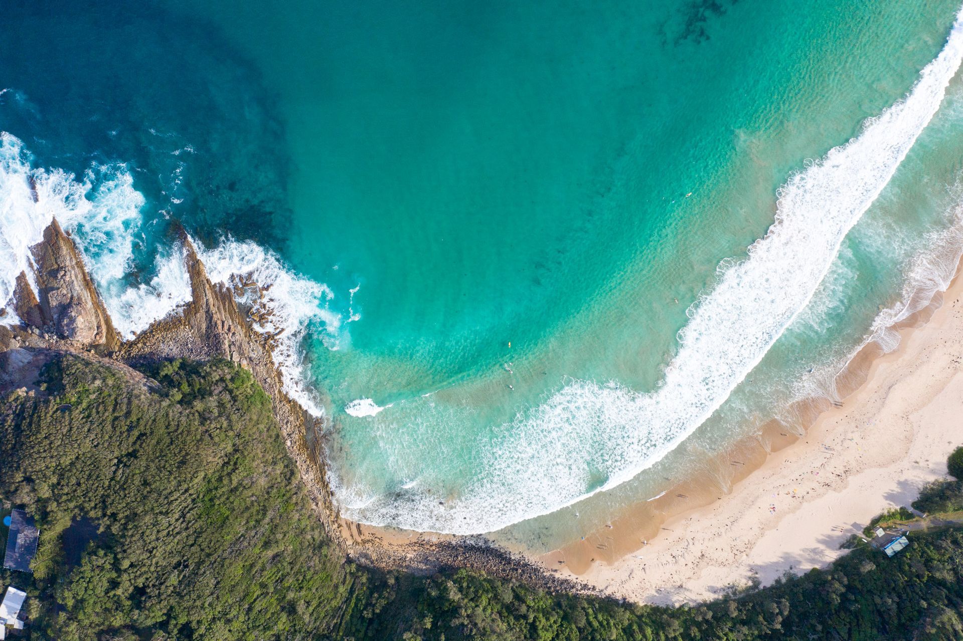 Aerial View of A Turquoise Ocean Coastline with Crashing White Waves — SeaChange Parks Milton in Milton, NSW