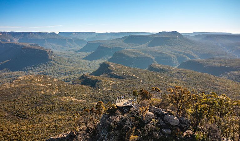 Overlooking Vast Valley With Dense Forest, Rocky Foreground, Clear Blue Sky — SeaChange Parks Milton in Milton, NSW