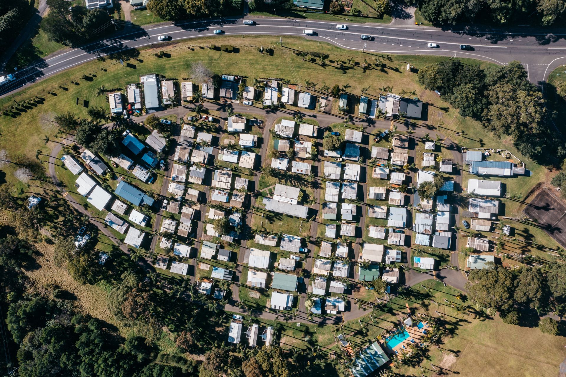 Aerial View of A Densely Packed Mobile Home Park Nestled in A Grassy Landscape Next — SeaChange Parks Milton in Milton, NSW
