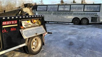 Bogarts Repair & Recovery's Truck Tow a Bus