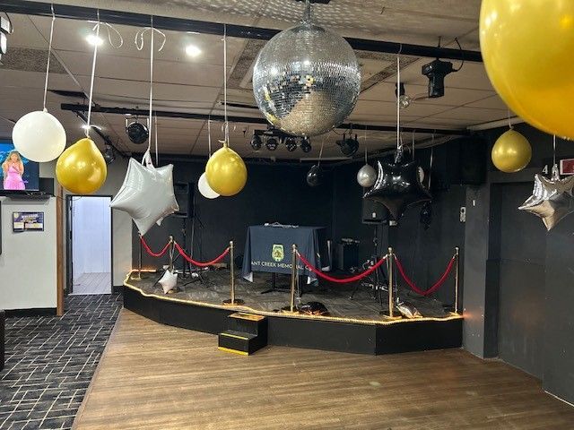 Blue and Silver Balloon Display in a Warmly Lit Indoor Venue — Tennant Creek Memorial Club & Steak House in Tennant Creek, NT