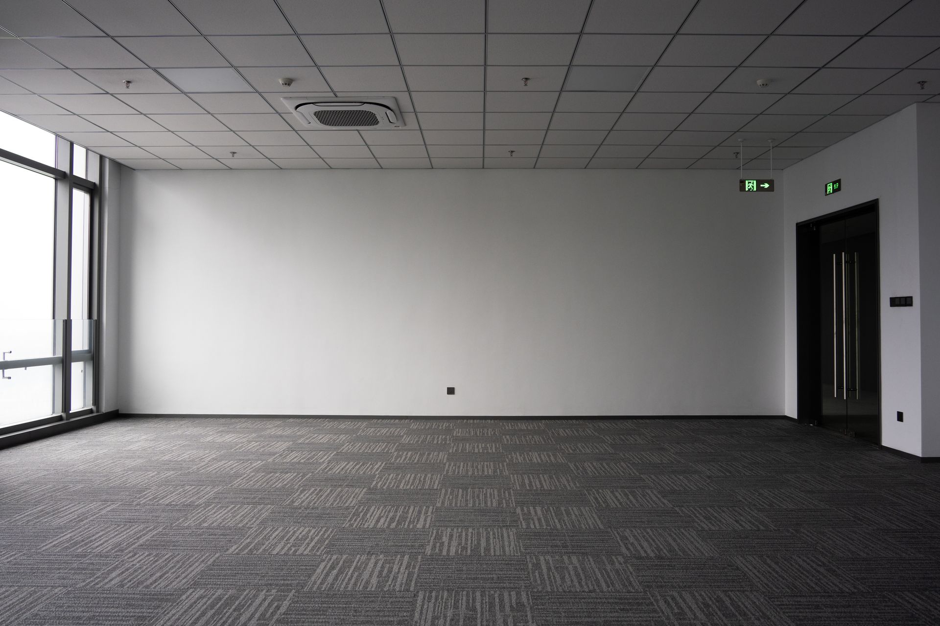 Wooden slatted ceiling with recessed lights in a modern interior
